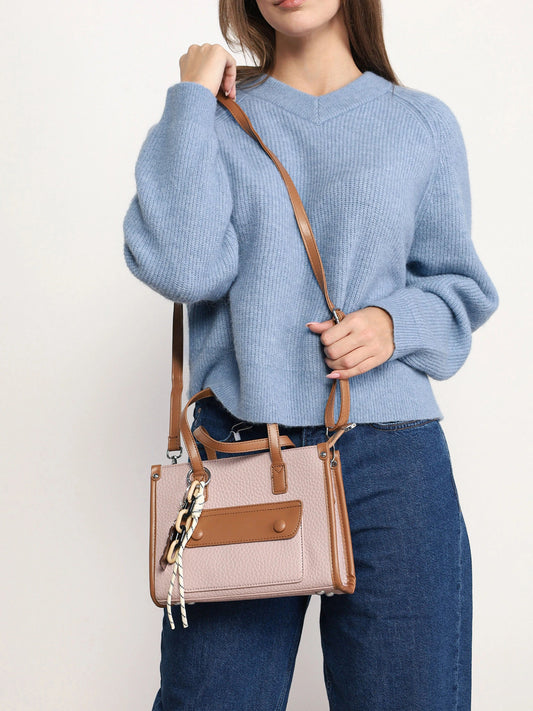 Cartera pequeña bicolor con bolsillo frontal