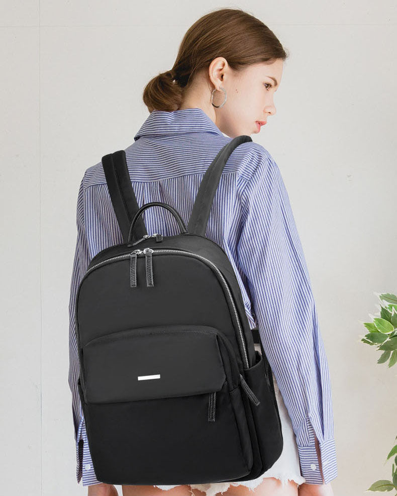 Mochila estilo casual unisex, ideal para viajes y uso diario