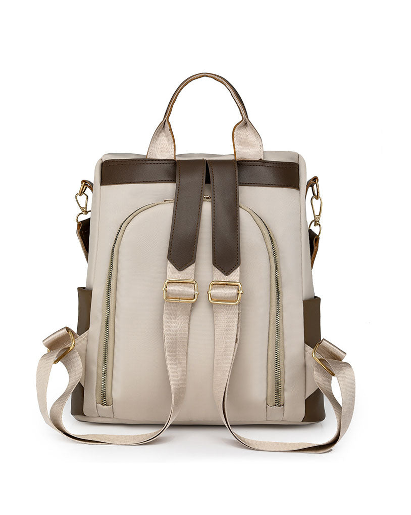 Mochila en tela con Detalles Marrones y Pompon Blanco