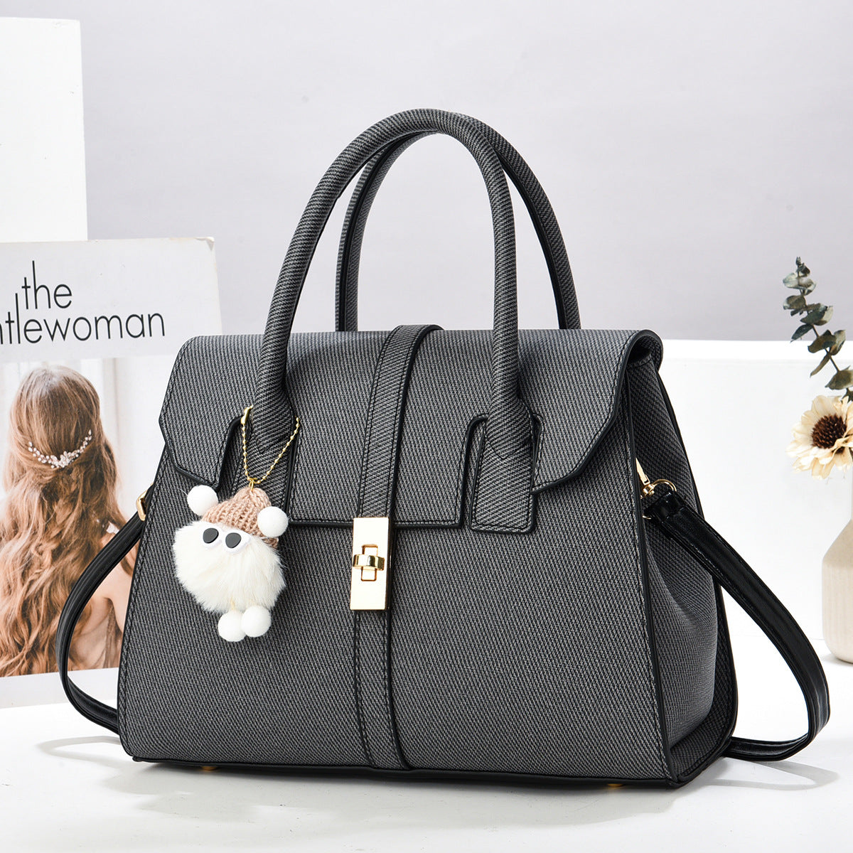 Mini cartera con llavero peluche