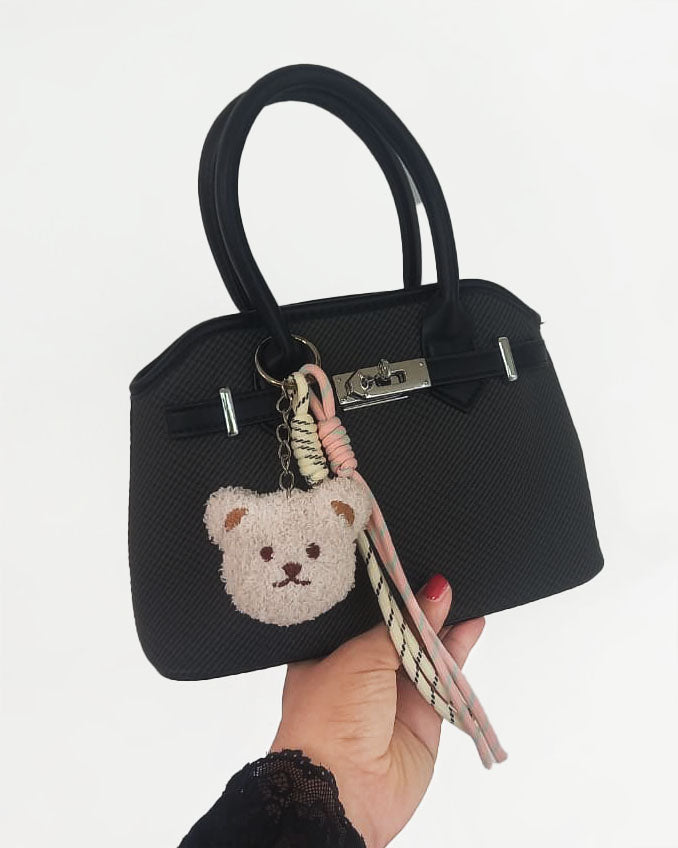 Mini cartera con cierre frontal decorativo y llavero de osito