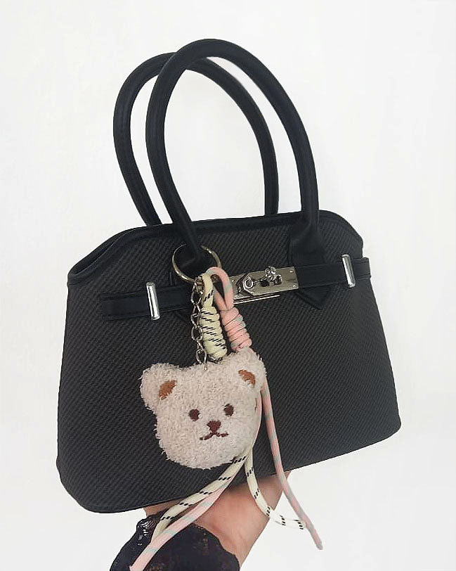 Mini cartera con cierre frontal decorativo y llavero de osito