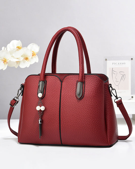 Cartera mediana con llavero colgante