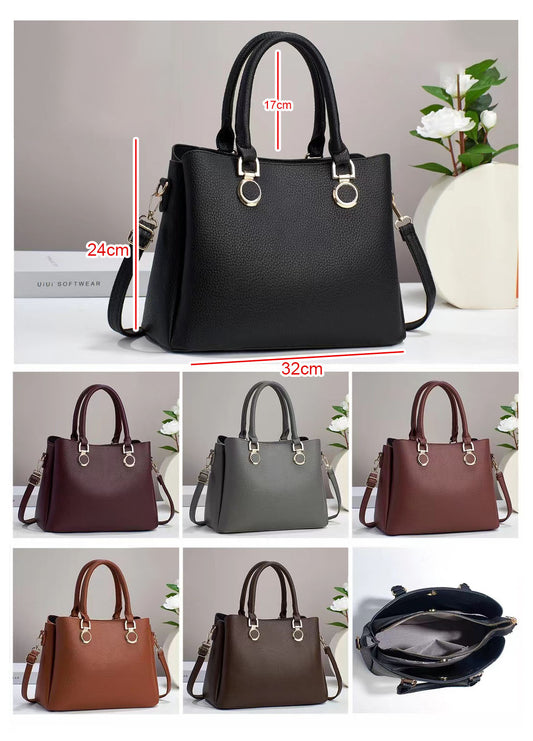 Bolso elegante de doble asa con aros decorativos