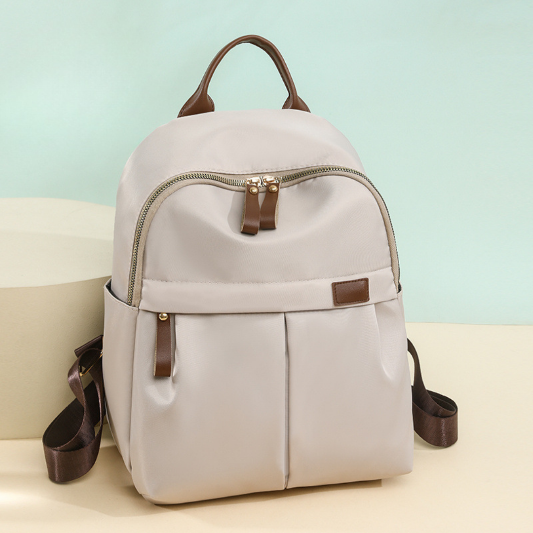 Mochila en tela con bolsillo frontal y bolsillos laterales