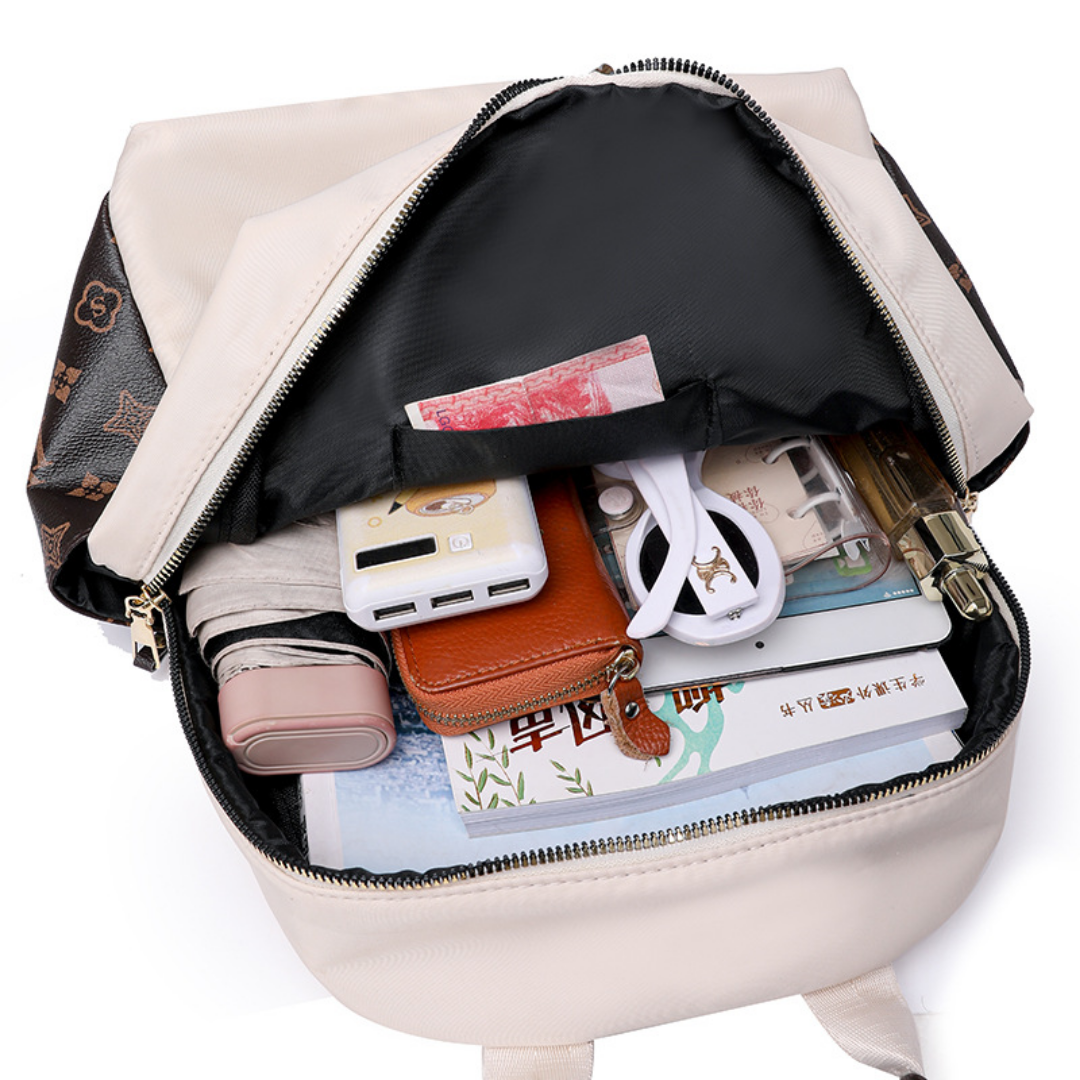 Mochila en tela con parche con carita sonriente, bolsillos laterales en marron