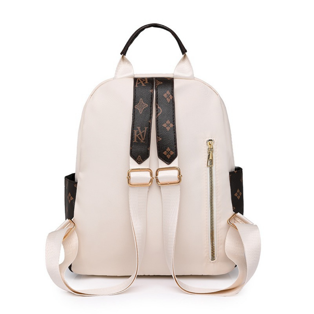 Mochila en tela con parche con carita sonriente, bolsillos laterales en marron