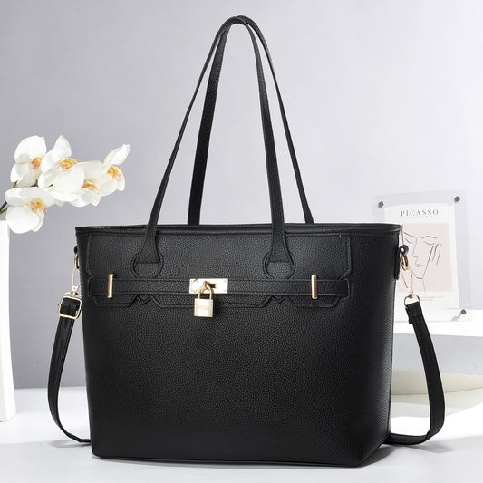 Bolso Grande con candado decorativo. Detalles en Dorado. Divisiones en el interior