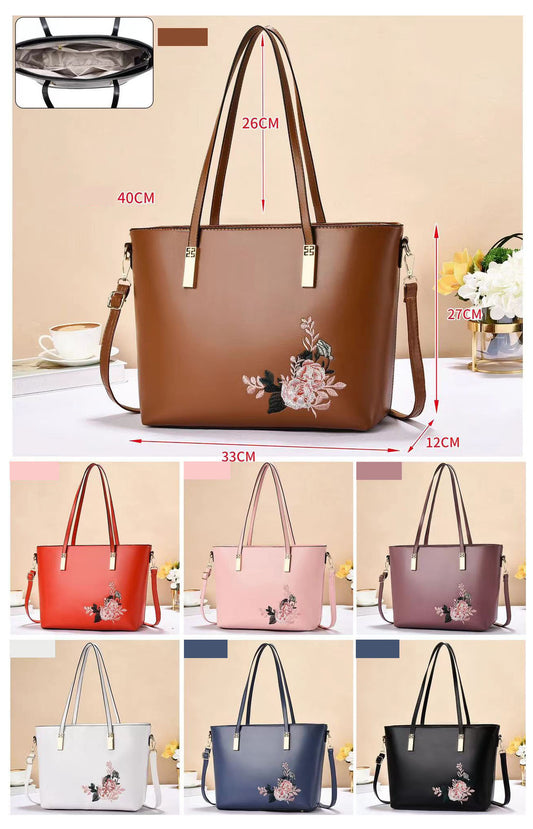 Cartera grande a la moda con diseño floral