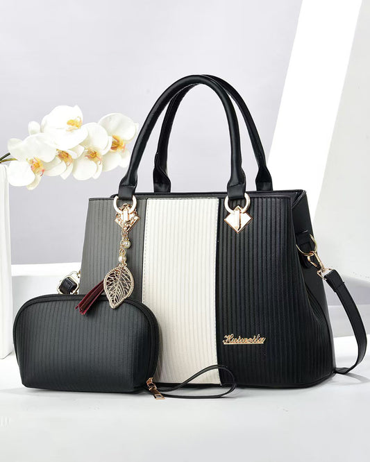 Cartera con diseño tricolor y neceser incluido