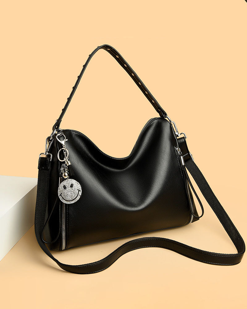 Cartera de Gran Capacidad con Colgante Sonriente – Modelo Suave y Moderno