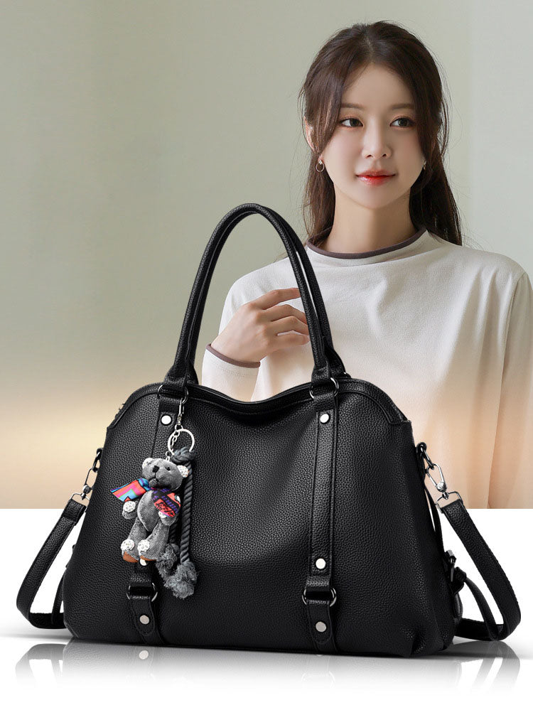 Bolso Mediano Suave de Tacto Liso, con Doble Asa, con Cierre Principal y Muñeco Decorativo