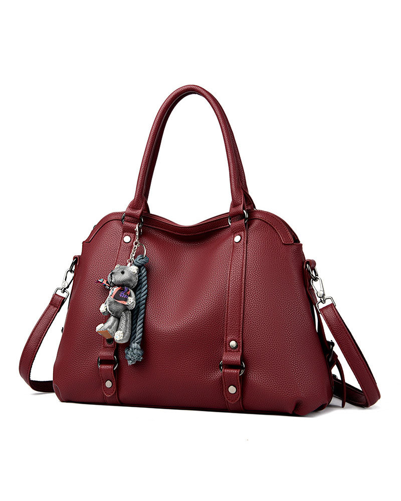 Bolso Mediano Suave de Tacto Liso, con Doble Asa, con Cierre Principal y Muñeco Decorativo