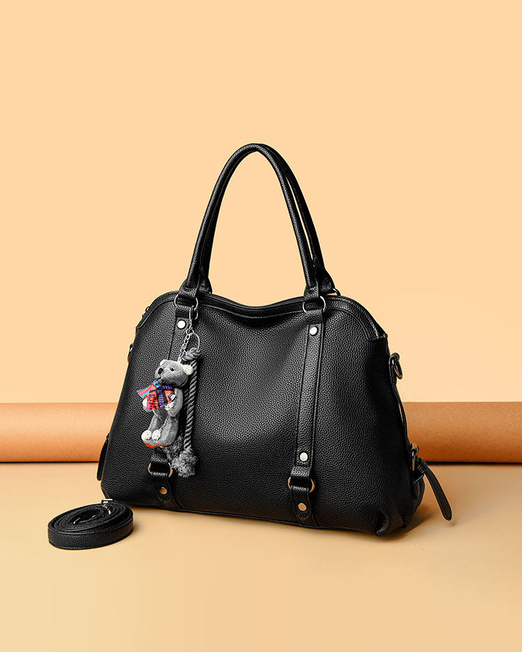 Bolso Mediano Suave de Tacto Liso, con Doble Asa, con Cierre Principal y Muñeco Decorativo