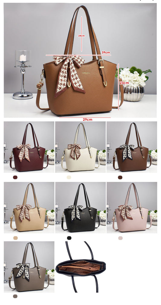 Cartera espaciosa con tiros para uso en hombro