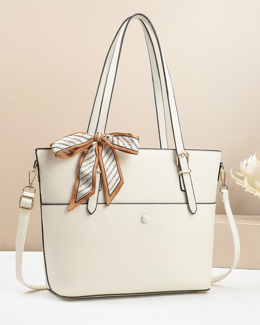 Cartera grande de buena capacidad con bolsillo frontal y lazo