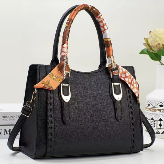 Cartera mediana con lazo decorativo