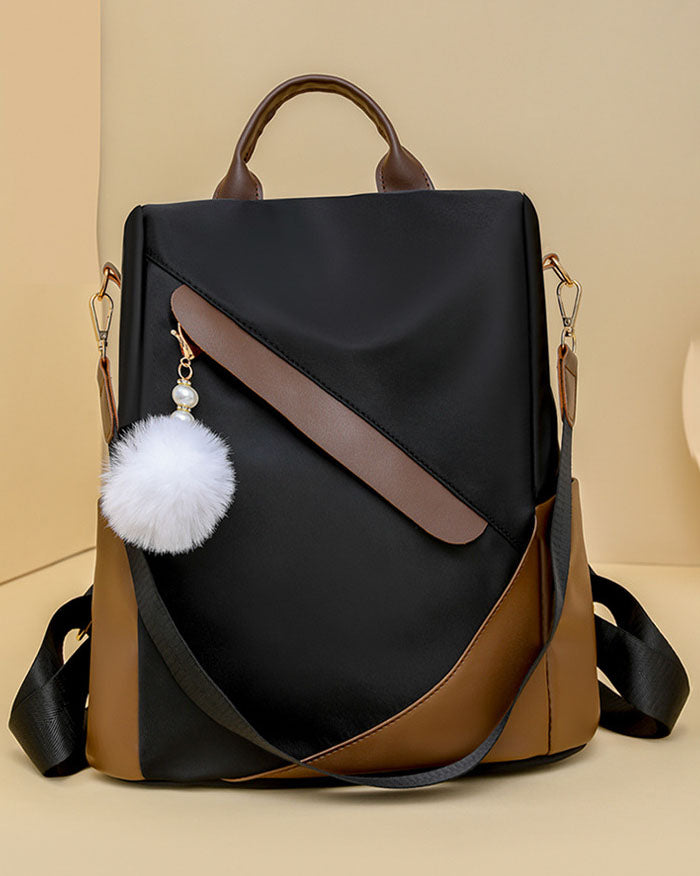 Mochila de tela con Pompon Blanco y Detalles en Marron