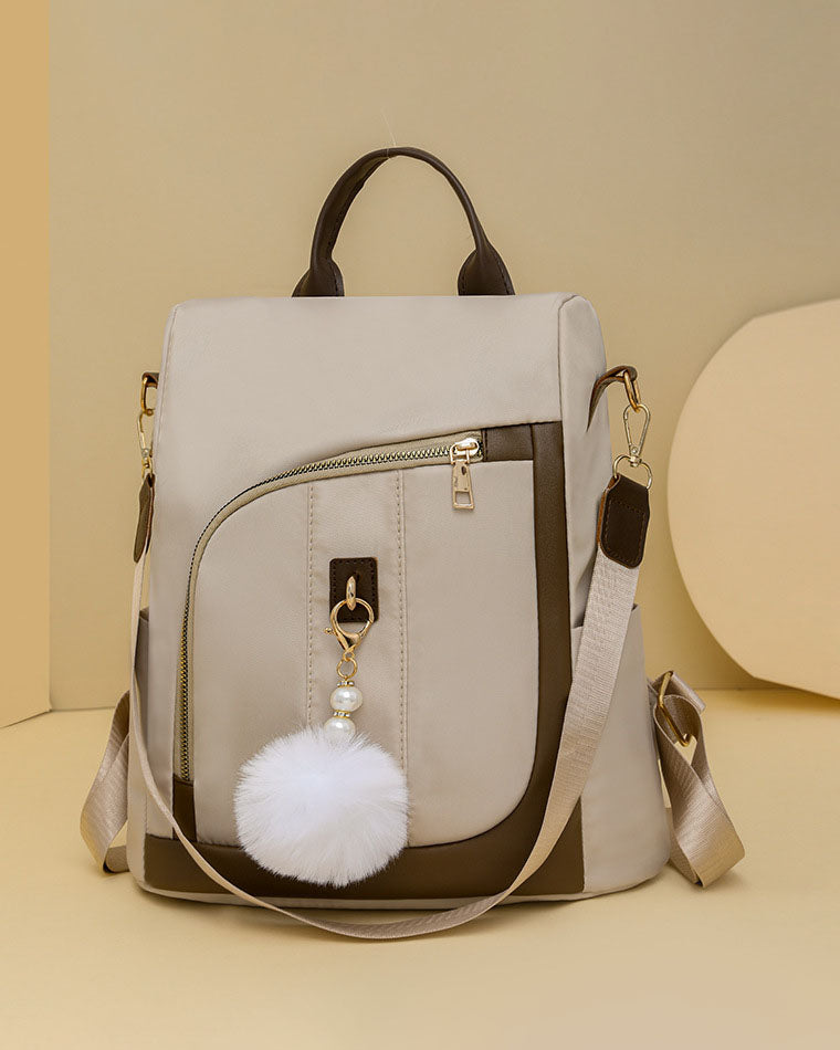 Mochila en tela con Detalles Marrones y Pompon Blanco