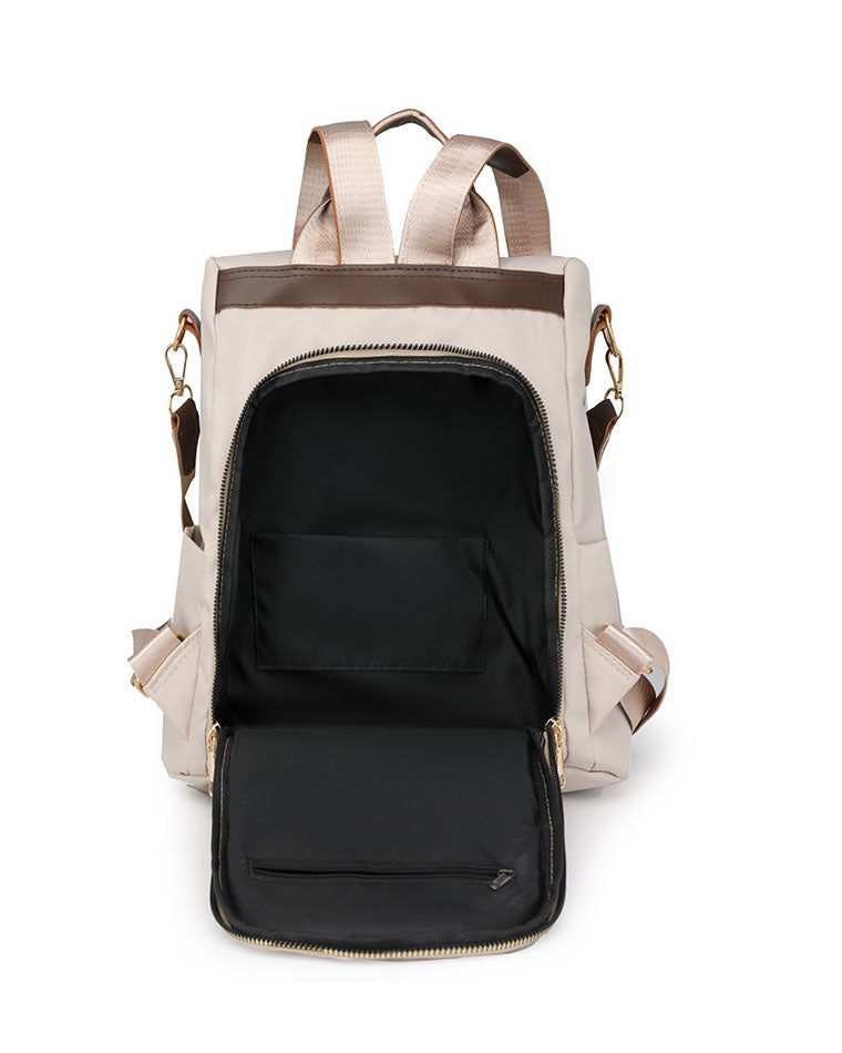 Mochila en tela con Detalles Marrones y Pompon Blanco