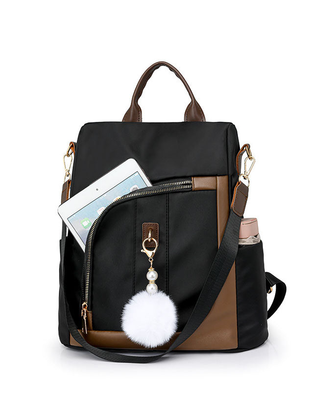 Mochila en tela con Detalles Marrones y Pompon Blanco