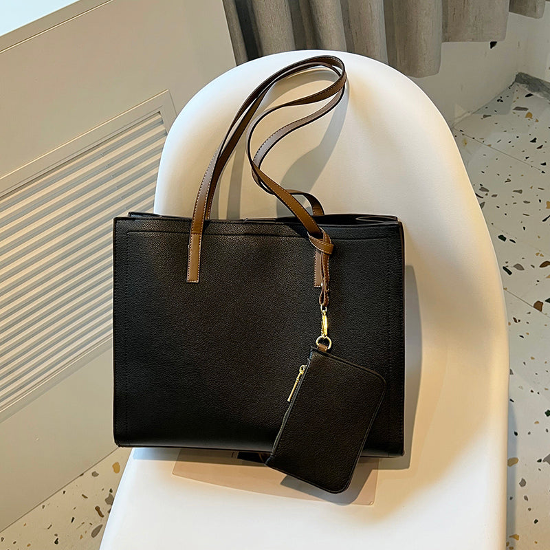 Bolso tipo cartera espaciosa