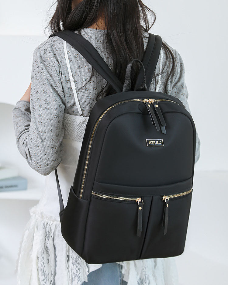 Mochila en tela con multiples compartimentos